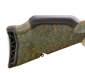 Vintage hunting rifle with wooden stock and scope for outdoor shooting.