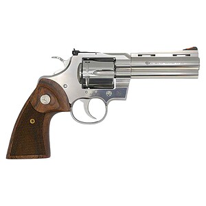 Revolver with wooden grip and metallic barrel, designed for shooting sports and collection.