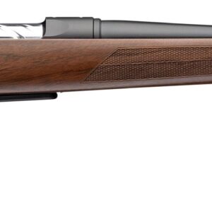 Vintage bolt-action rifle with wooden stock and long barrel.