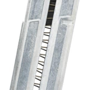 Metal firearm magazine with magnetic base for reliable loading.