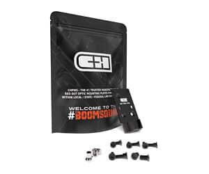 Guitar string set with black packaging and assorted accessories for professional sound.