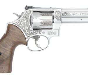 Smith & Wesson 686 Plus engraved stainless revolver with walnut grips and 4.13 inch barrel