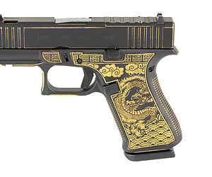 Glock GLOCK 43X compensated 9mm pistol with Black and Gold Cerakote and ported barrel