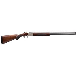Classic hunting shotgun with wooden stock and long metal barrel.