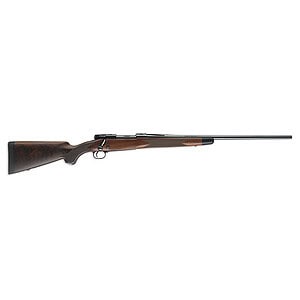 High-quality hunting rifle with wooden stock and long barrel.