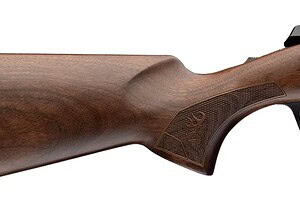 Vintage bolt-action rifle with wooden stock and metal barrel for hunting and shooting sports.